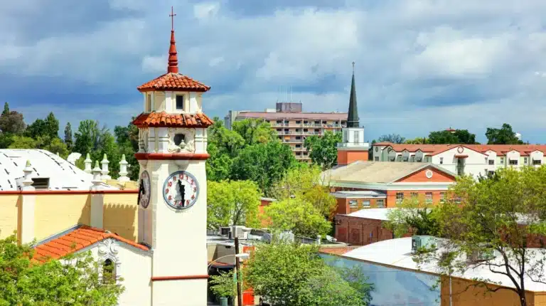 Fox Theatre in Visalia, California with surrounding buildings and downtown roadway.